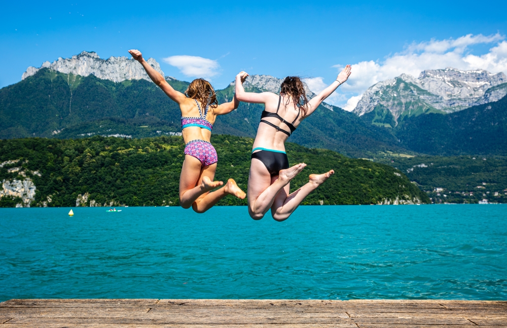 Hooray,For,Summer!,Two,Teen,Girls,Jumping,Into,Lake,Annecy
